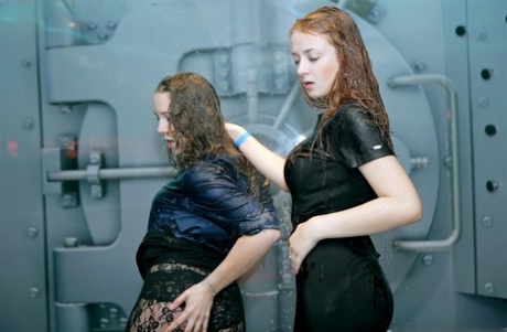Collection of lesbian girls getting soaked by a sprinkler system while dancing