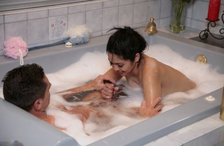 Hot Asian masseuse Mika Tan with big tits giving handjob & footjob in bath - pornpics.de