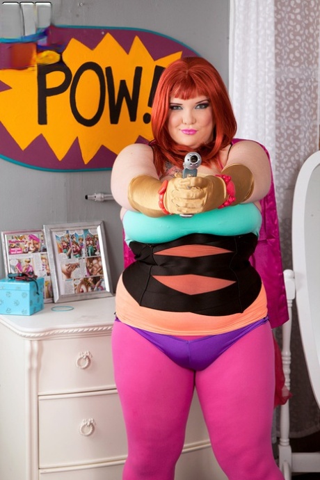 Redheaded fatty Kitty Mcpherson releases her large boobs from cosplay attire