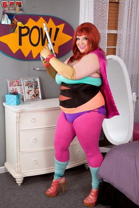 Redheaded fatty Kitty Mcpherson releases her large boobs from cosplay attire - pornpics.de