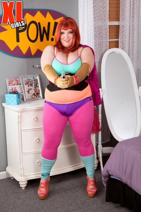 Redheaded fatty Kitty Mcpherson releases her large boobs from cosplay attire - pornpics.de