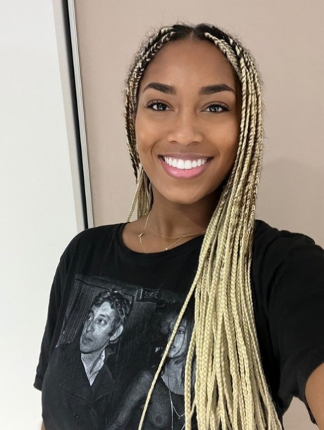 Ebony solo model Laila Santiagoo sports a nice smile during SFW action