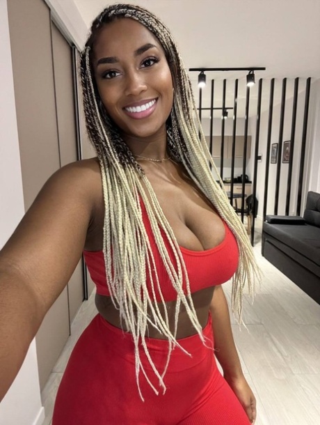 Ebony solo model Laila Santiagoo sports a nice smile during SFW action