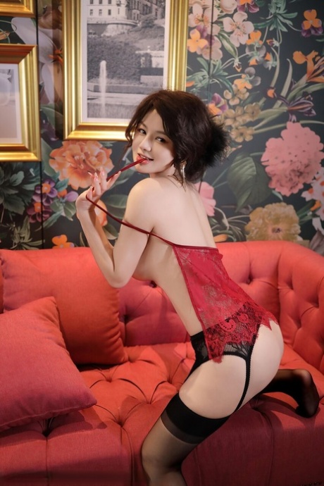 Sexy Asian wife flaunts her natural tits and huge ass in lingerie