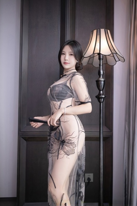 Glamorous Asian wife Xiuren posing in her provocative lingerie in a solo