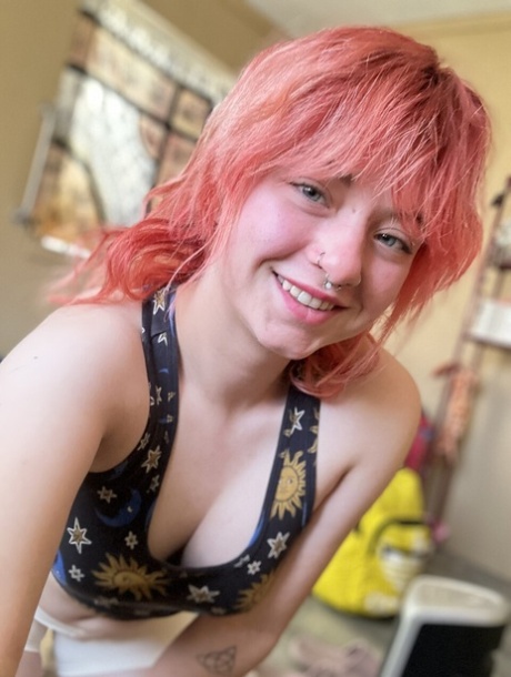 Amateur model Redhead Abby takes self shots while wearing spandex shorts