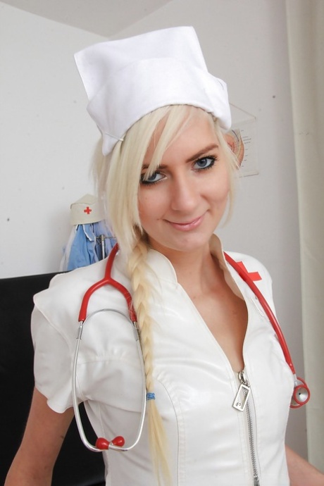 Simone has her new nurse uniform so she shows her pussy close up - pornpics.de