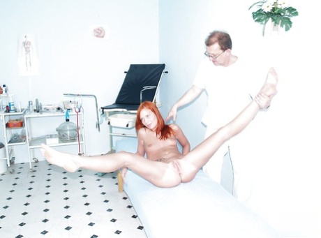 Nice looking redhead fetish milf gets fingered at the gyno cabinet - pornpics.de
