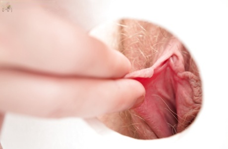 Girl in glasses pulls down panties for extreme close up of hairy cooter