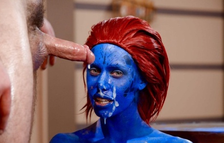 Redheaded cosplay pornstar Nicole Aniston giving big cocks bj in MMF 3some