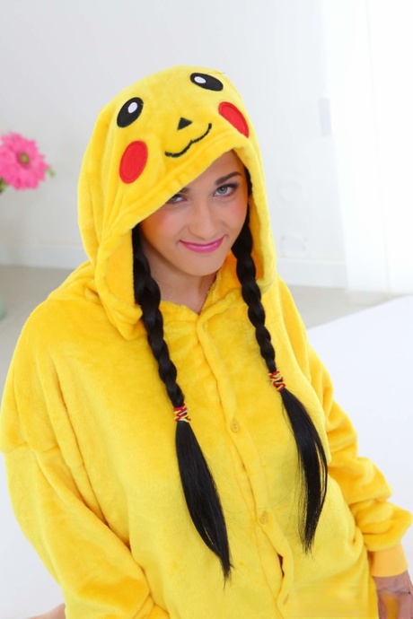 Sweet teen in Pikachu costume Nicole Love flaunts her boobs and toys herself - pornpics.de