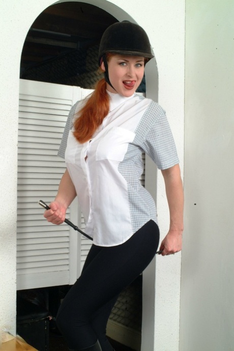 Busty horse rider Katarina strips to nylons and flaunts her incredible tits