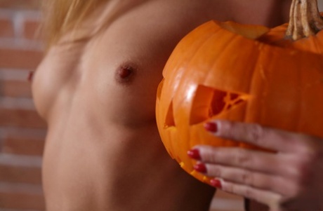 Slim pornstar in fishnets Alexis Crystal rubs her twat on Halloween - pornpics.de