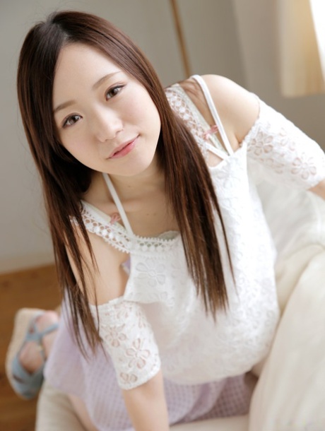 Japanese cutie Mao Sena shows her tiny boobs gets her bush fingered and fucked