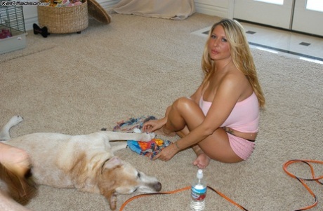 Blonde pornstar Summer Sinn baring her giant knockers at Kelly