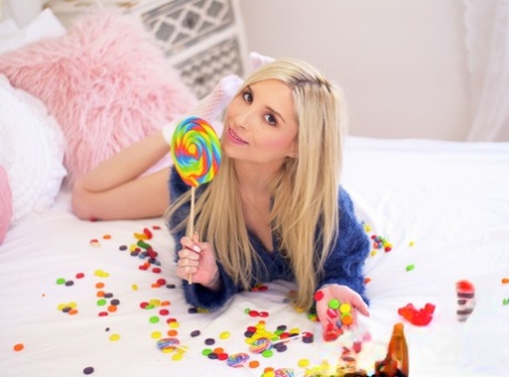 Tiny blonde teen Piper Perri licks a lollipop & gets a POV fuck & messy facial