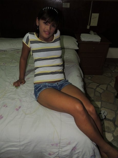 Petite Filipina Maricel gives sloppy head and rides a dick in the dark