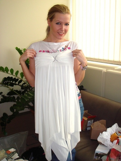 Adorable Hungarian blonde girl Sophie Moone trying on her new outfit