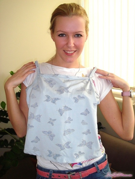 Adorable Hungarian blonde girl Sophie Moone trying on her new outfit