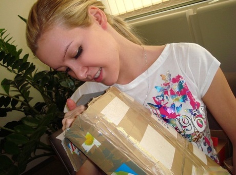 Adorable Hungarian blonde girl Sophie Moone trying on her new outfit