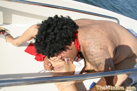 Petite Latina girl with braces sucks off a fat guy atop his yacht