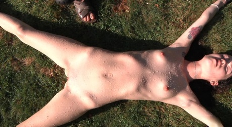 Suffering slave Misha Cross bound spreadeagled outdoors for water-play torture - pornpics.de