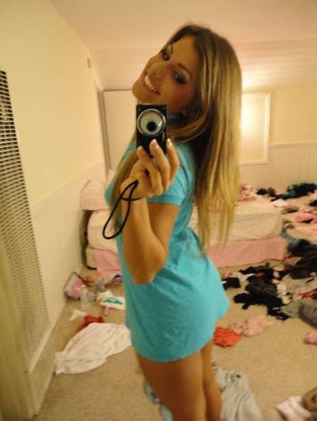 Hot blonde looker Bella Beyle disrobes to take selfies of her naked Latina ass