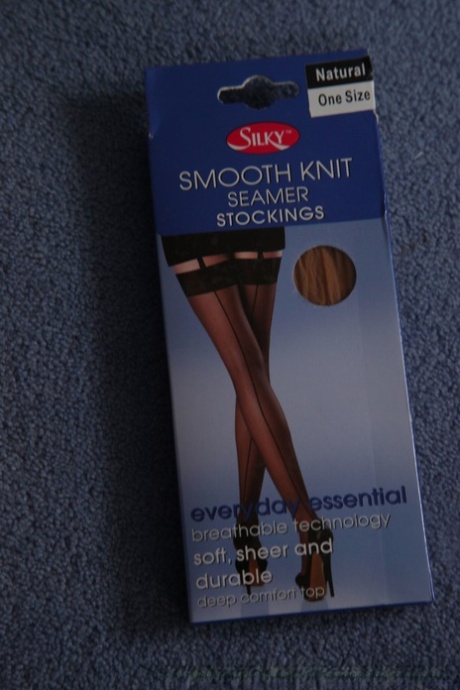 Thin blonde Gina Gerson strips her dress & undies to pose in garter belt only - pornpics.de