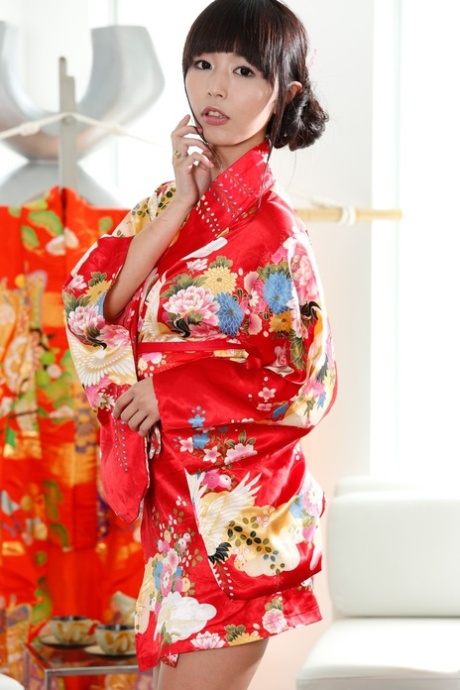 Japanese brunette woman Marica Hase takes off her kimono and shows off - pornpics.de