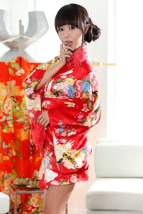 Japanese brunette woman Marica Hase takes off her kimono and shows off - pornpics.de