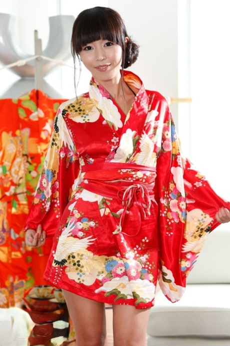 Japanese brunette woman Marica Hase takes off her kimono and shows off - pornpics.de