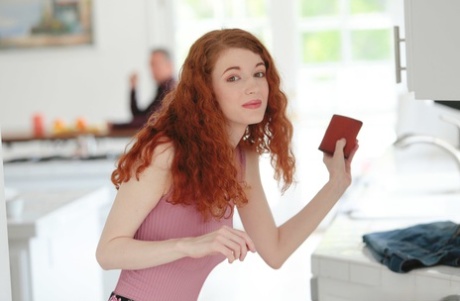 Curly haired redhead Abbey Rain nailed doggystyle by stepdad while gaming