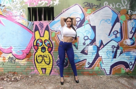 Huge titted Latina Marta La Croft peels spandex pants for big ass garden bang