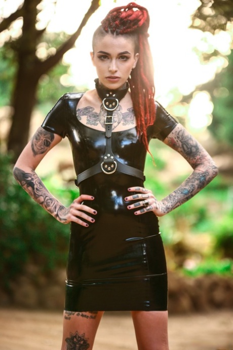 Goth girl Leigh Raven works clear of latex dress for nude solo poses