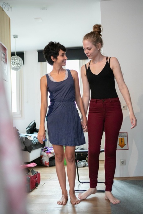 Tiny titted lesbian girls Anais V & Rose K show hot bush while donning clothes