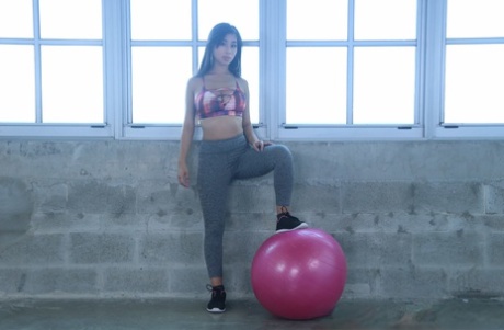 Petite Asian teen Jade Kush posing butt naked on stability ball - pornpics.de