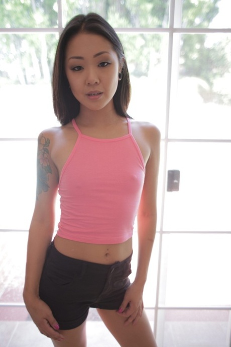 Brunette Asian with a skinny body Saya Song showing her tight ass