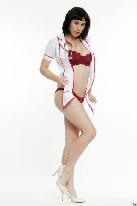 Stunning nurse Olive Glass slowly takes off uniform and shows her sexy body - pornpics.de