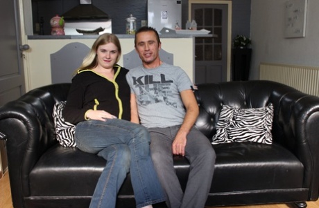 Hot German wife Mona takes an open mouth cumshot after hardcore sex on a couch