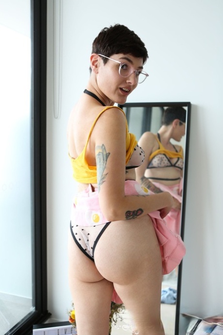 Nerdy girl next door Peachy in glasses bares her tall natural body & spreads