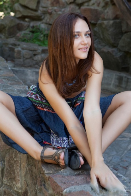 Beautiful brunette babe Zlatka exposes her tasty twat and poses in the park