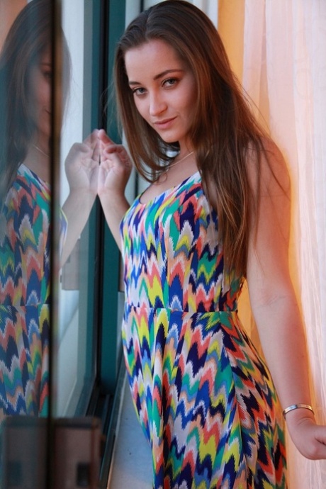 Dani Daniels takes off her colorful dress to show big ass and natural tits - pornpics.de