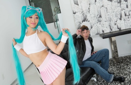 Asian cutie Ayumu Kase seduces a white boy in her cosplay outfit
