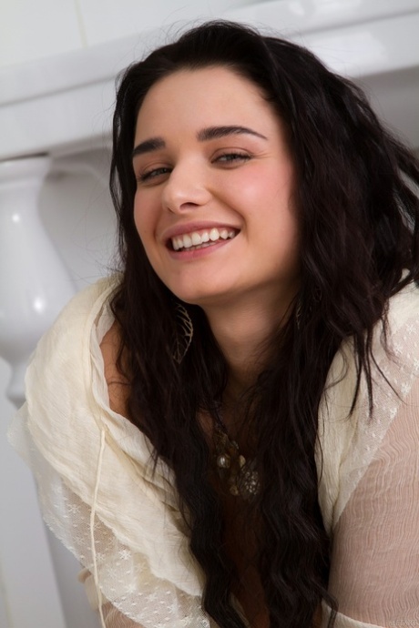 Horny cutie with a wonderful butt Lera E gets nude in the bathroom