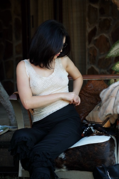 Raven-haired teen goddess Malena showing her cuddly tits & her bald twat