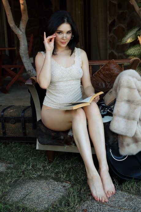 Raven-haired teen goddess Malena showing her cuddly tits & her bald twat