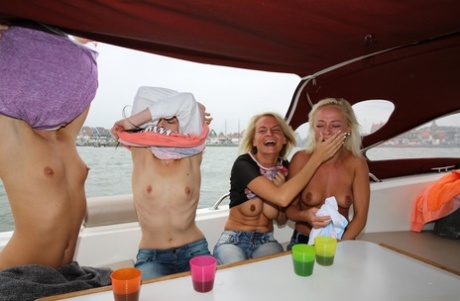 Amateurs Vanda L, Naomi I, Jessie C & Daniella C fuck in a lesbian boat 4some