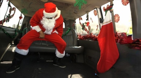 Lusty newbie Mia Monroe gets pounded by a Santa Claus in the van