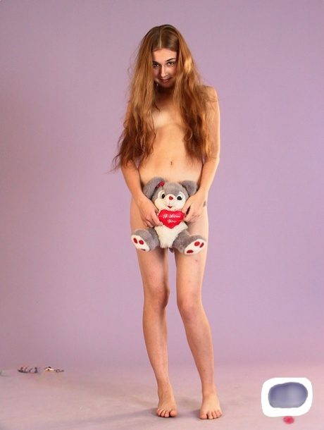 Long-legged amateur teen Lera strips her shirt & panties to pose nude
