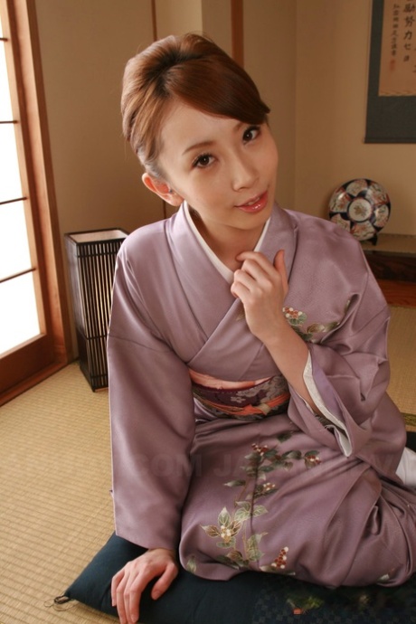 Asian wife Yui Saejima drops her robe and gets rammed by two guys - pornpics.de